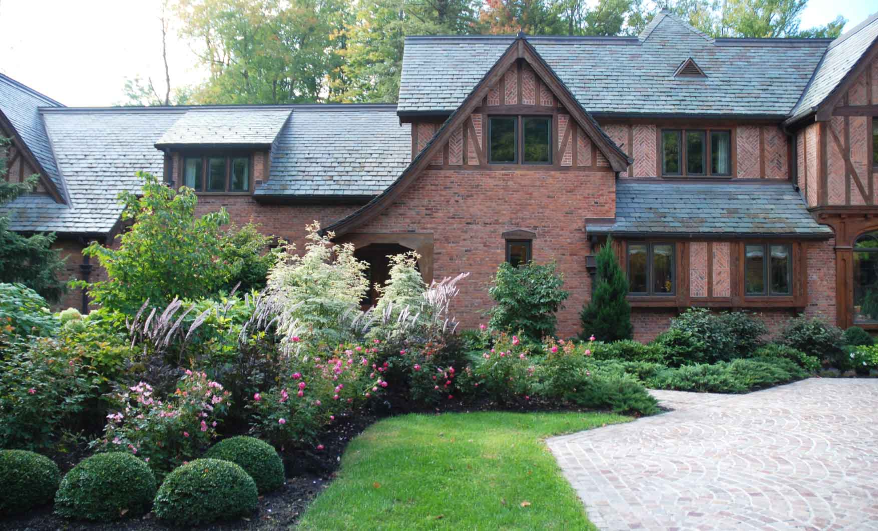 country-tudor-house-renovation-brick-slate-garden
