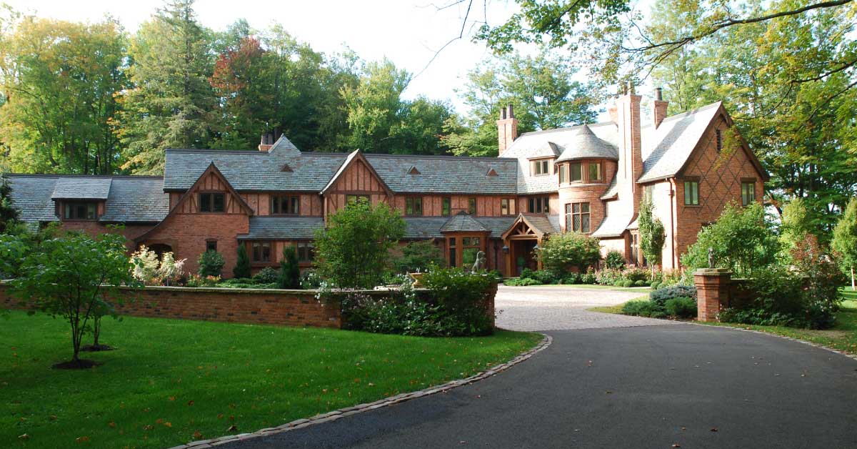 Country-tudor-house-joe-dick-red-brick-slate-roof-chimneys