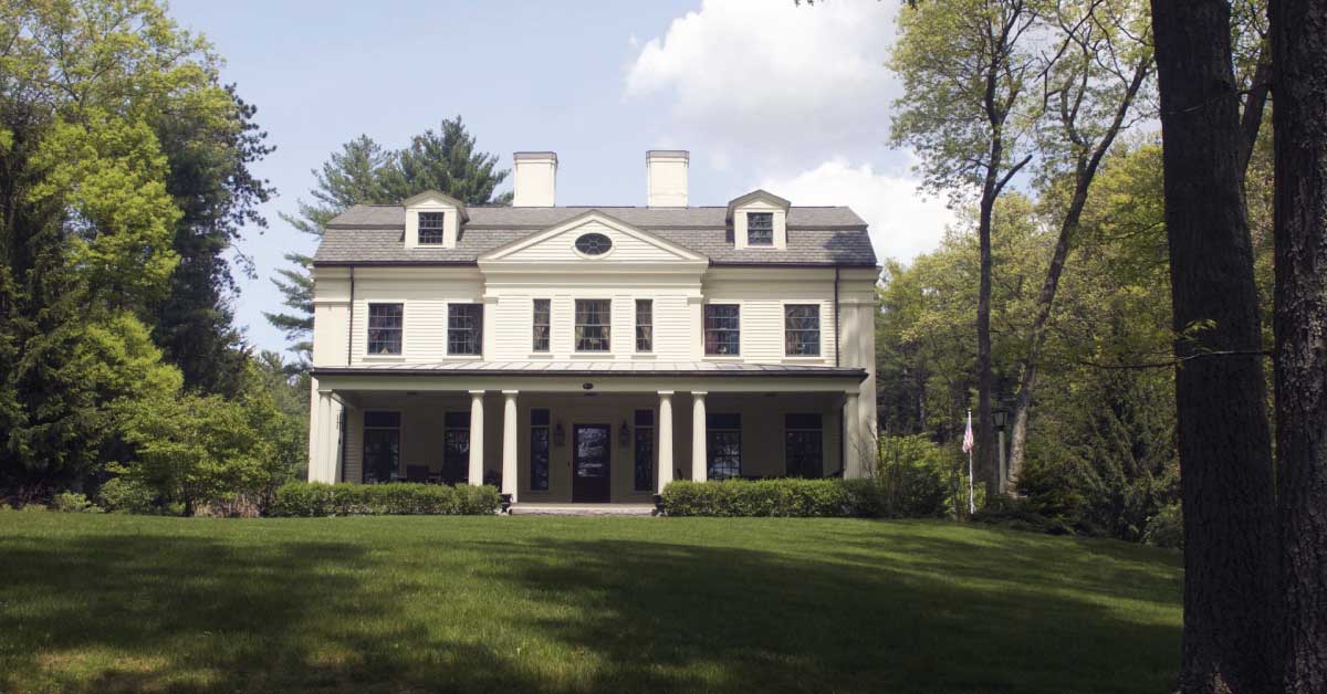 Greek revival home joseph w dick front view lawn elegant