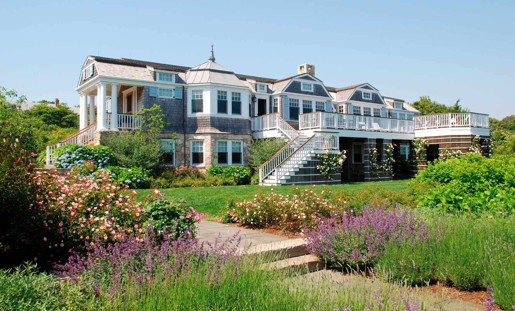 Beach home side view with flower gardens